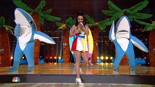 Katie Perry dances at the Super Bowl with left shark